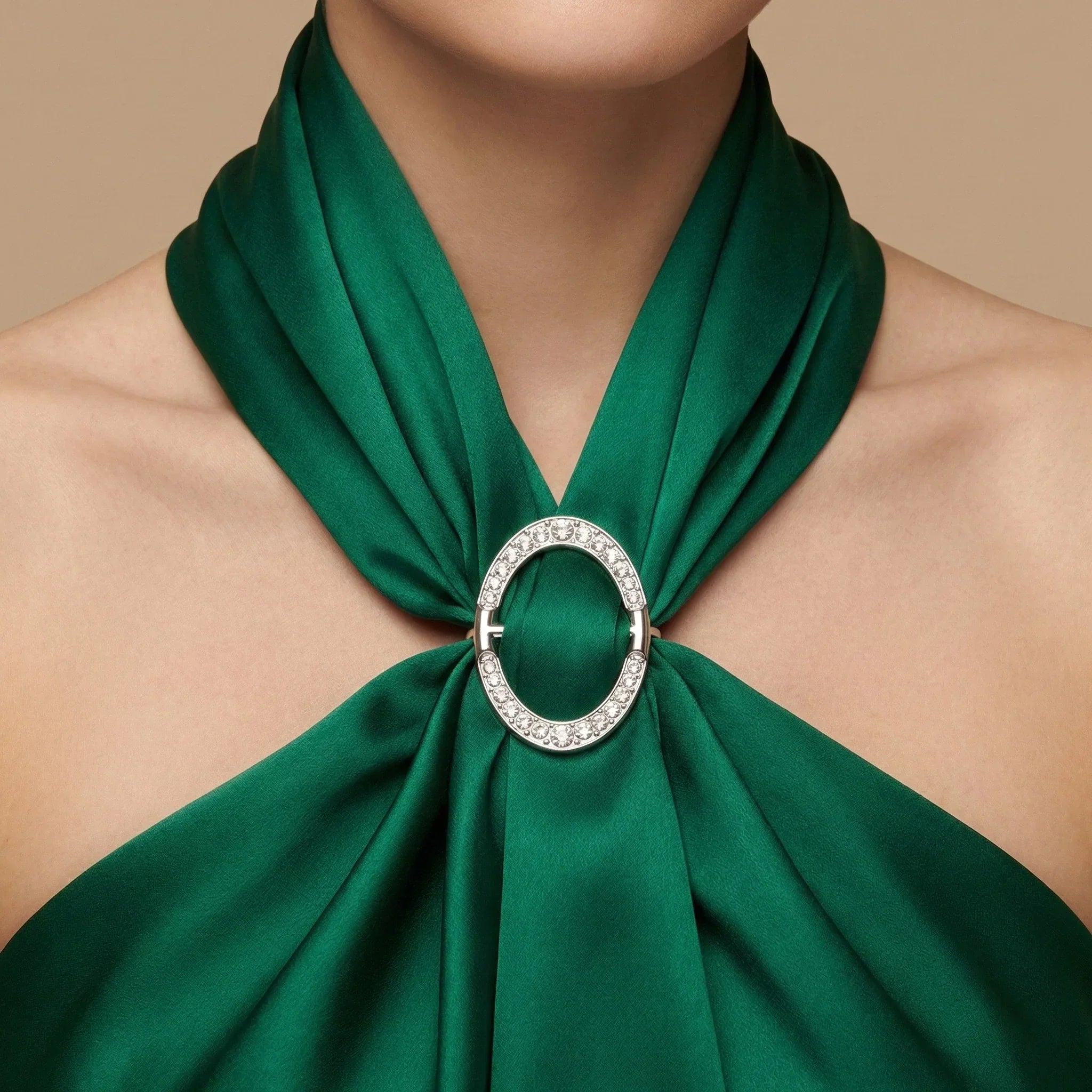 Emerald green satin scarf with diamond-encrusted silver oval clasp in Metal Scarf Ring collection Image