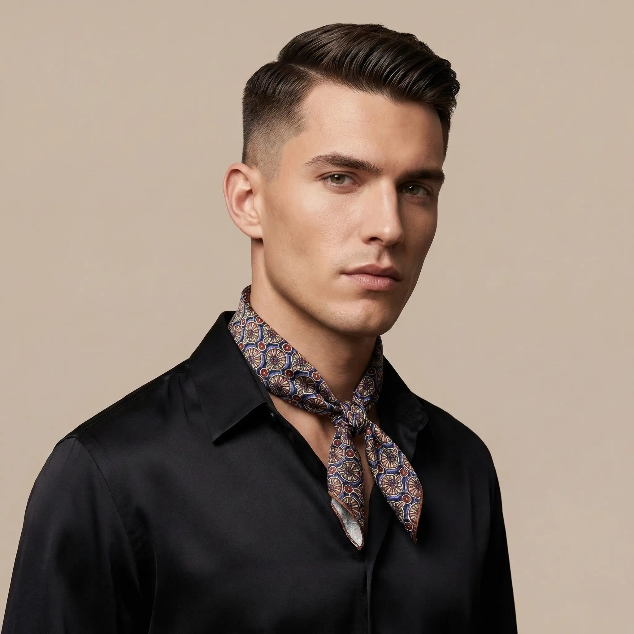 Patterned silk neckerchief scarf with blue brown gold circular designs Image