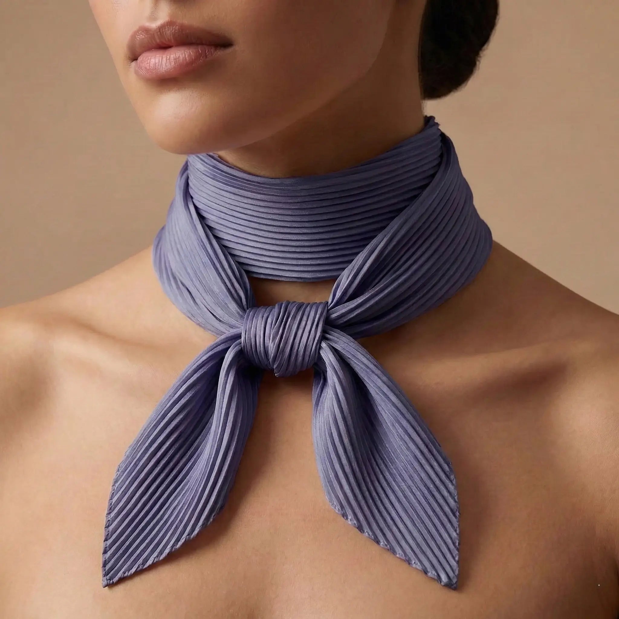 Soft lavender pleated scarf from Purple Scarf collection tied in neat neck knot Image