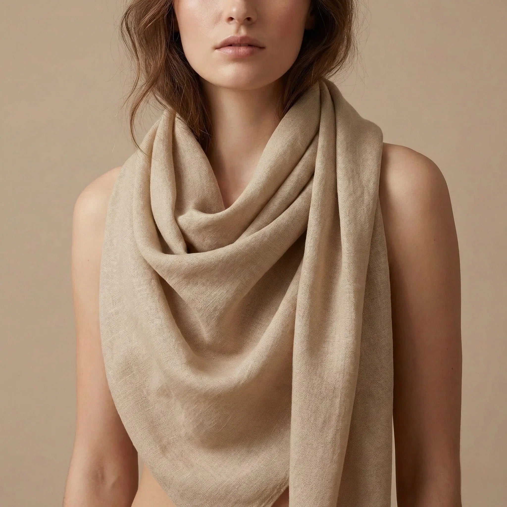 Beige linen scarf draped elegantly around neck from Wool Scarf collection Image