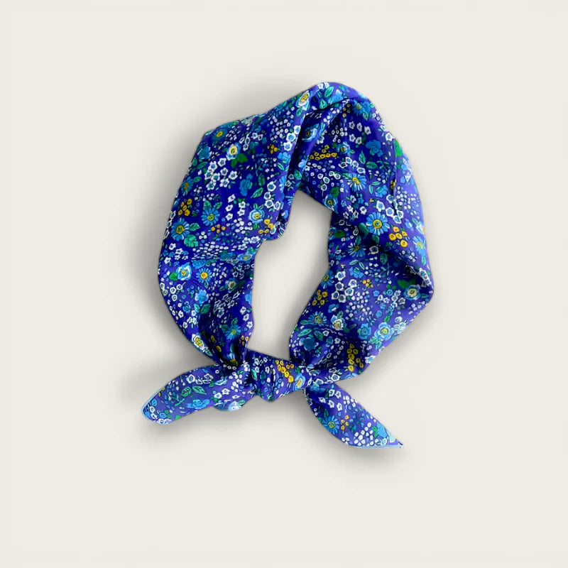 Vibrant blue 100% cotton scarf with white yellow green floral bandana knot