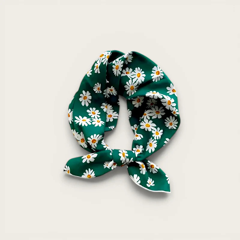 Green silk scarf with white daisy pattern in 60x60 cotton style, neatly knotted