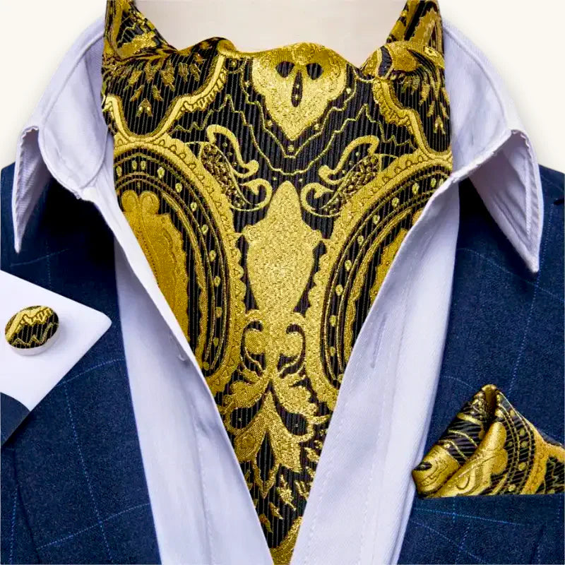 Luxurious black and gold baroque ascot cravat on white shirt