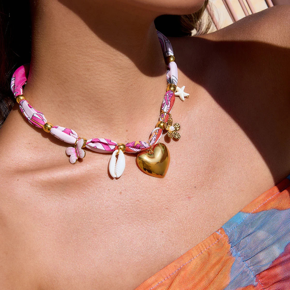 Vibrant pink white Bandana Scarf Necklace with gold beads heart cowrie butterfly starfish