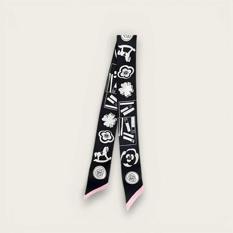 Black Ribbon Scarf: black silk with white book, flower, rocking horse prints, pink edges