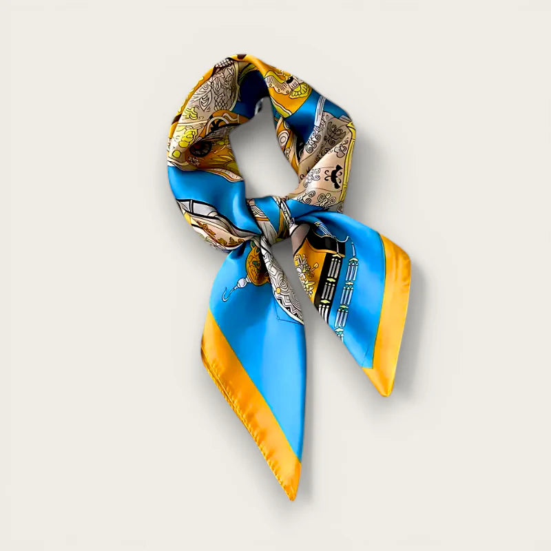 Vibrant blue and yellow silk scarf with vintage knot pattern