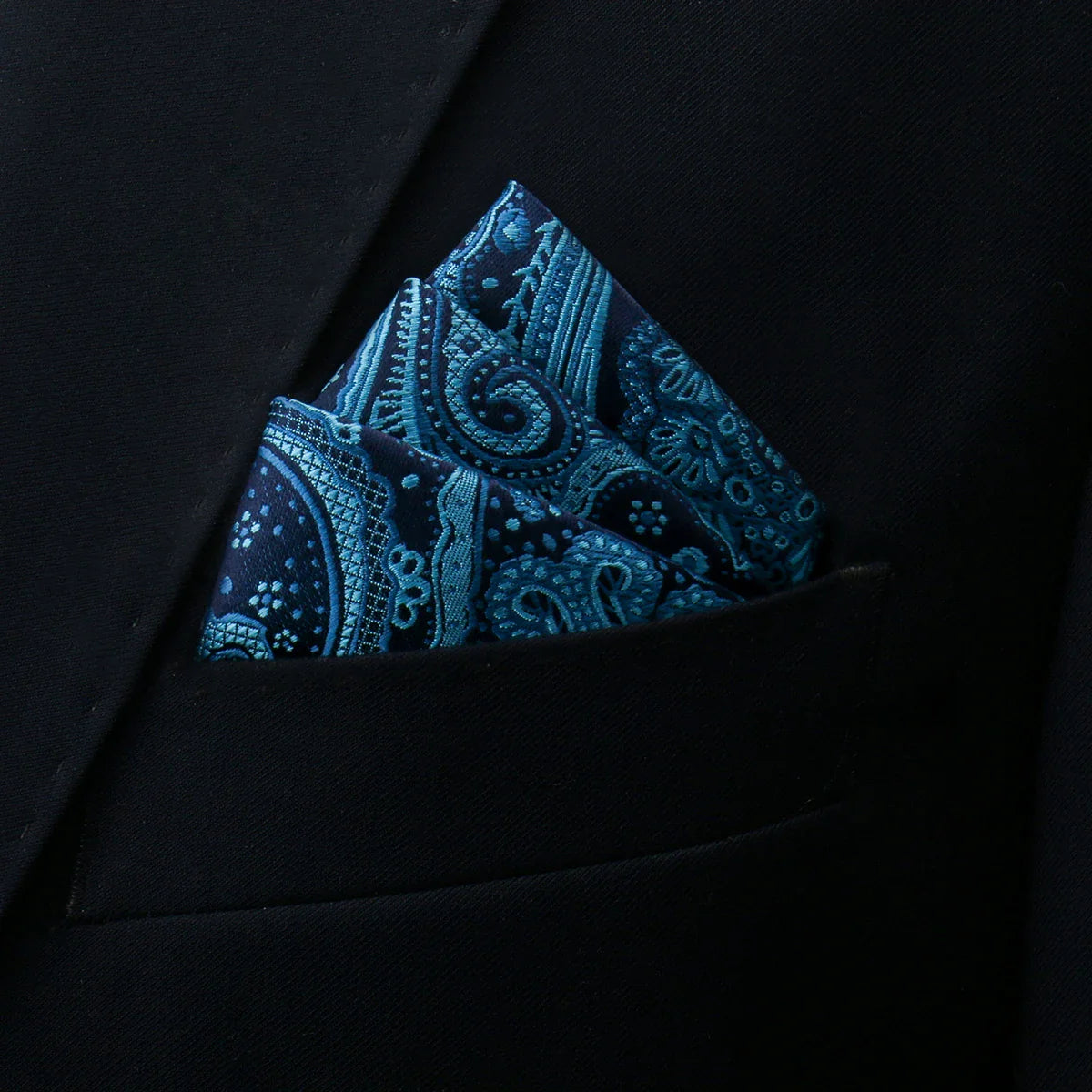 Blue floral pocket square in navy with teal paisley patterns