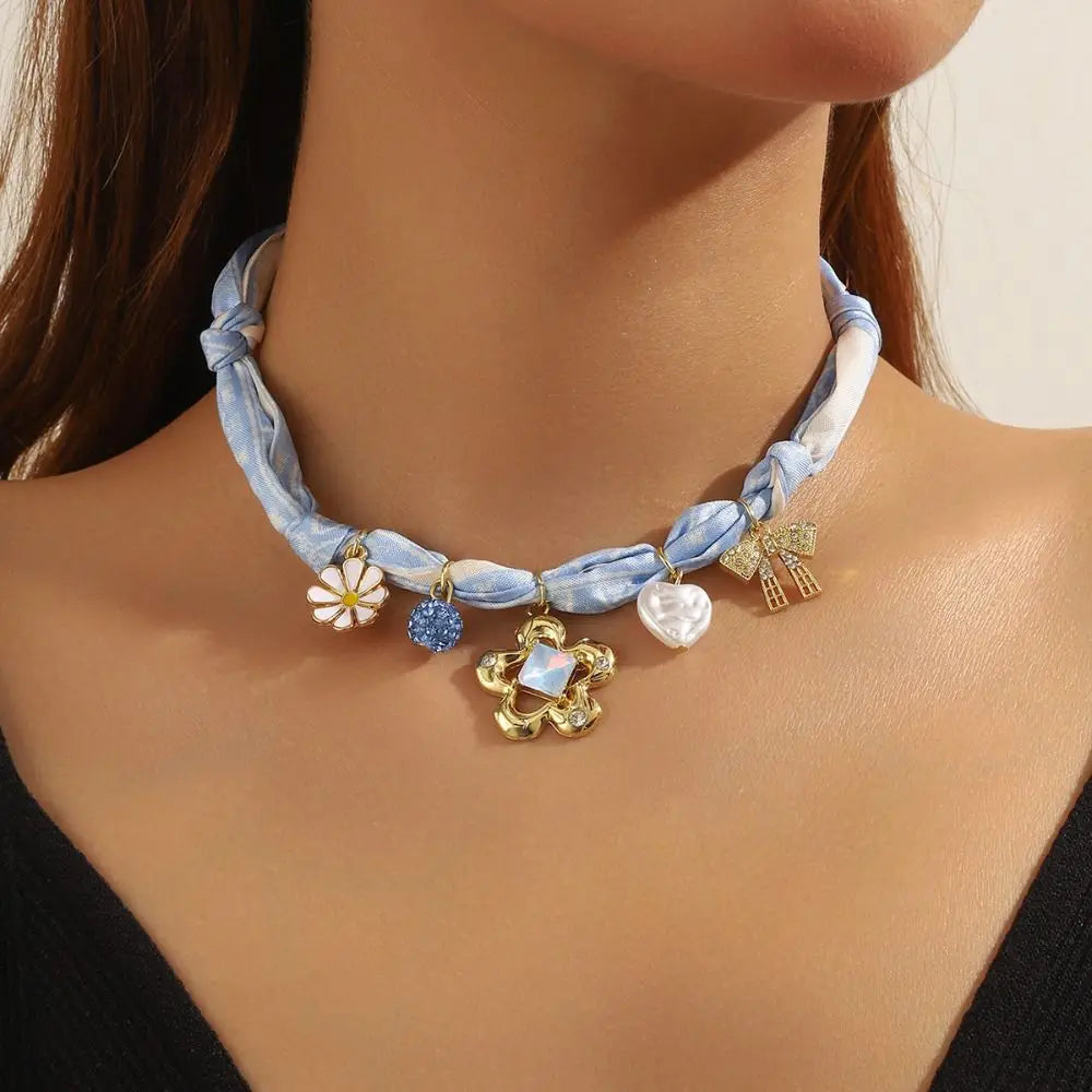 Blue flower scarf necklace: light blue denim ribbon choker with daisy, crystal, pearl heart, floral charms