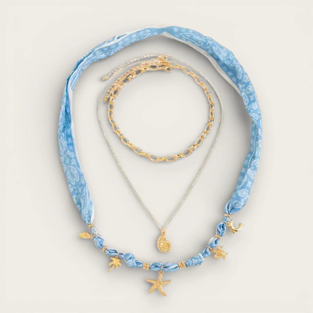 Blue scarf necklace with gold sea charms, silver chain, gold bracelet