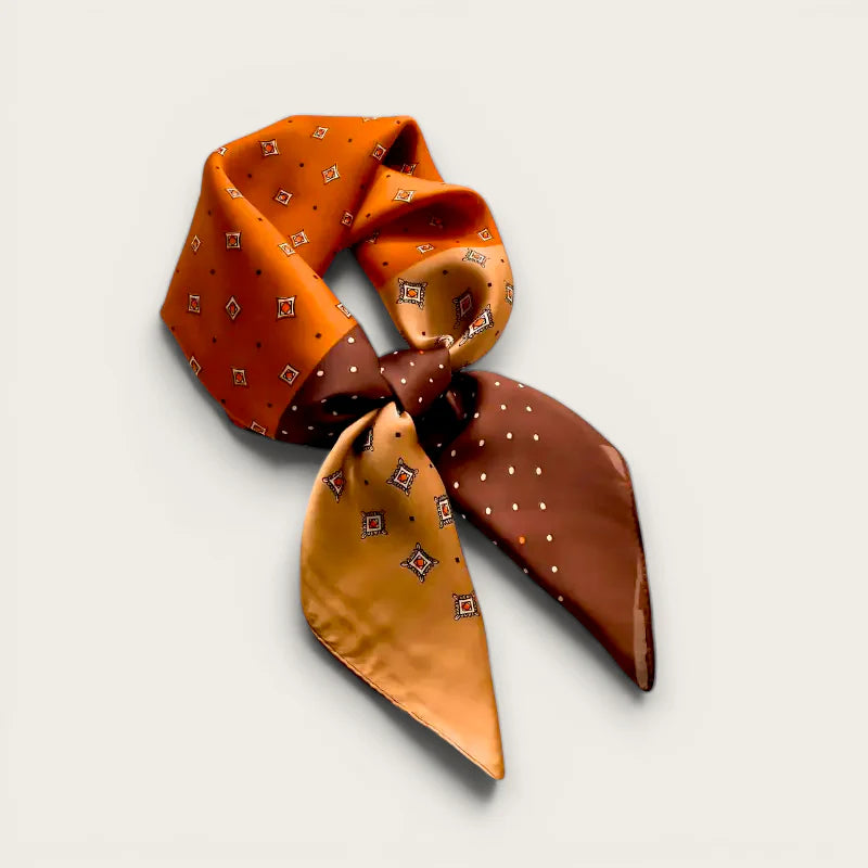 Luxurious orange brown silk geometric hair scarf in elegant knot