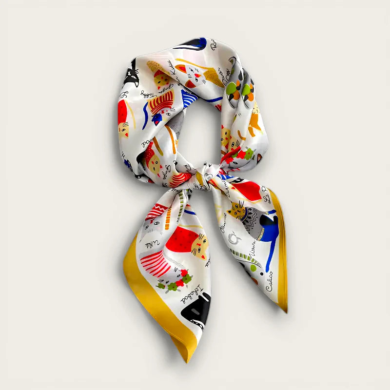 Cat Print Scarf: white silk with colorful cartoon cats, whimsical designs, yellow edges