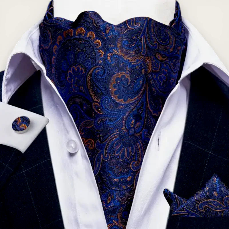 Deep blue paisley cravat ascot scarf with gold bronze accents, pocket square, cufflinks