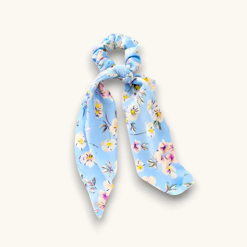 Cute Bow Scrunchie in light blue floral-patterned fabric