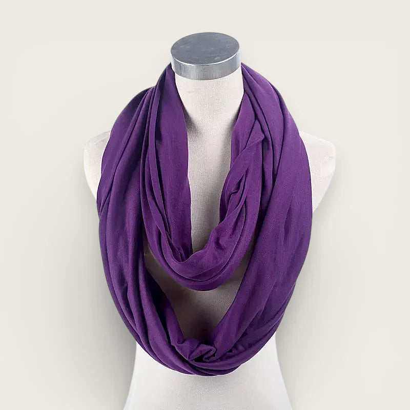 Dark purple infinity scarf draped around mannequin neck