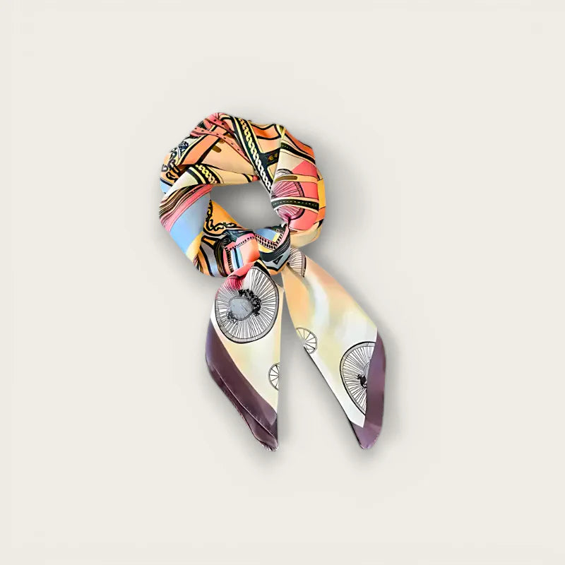 Vibrant geometric silk scarf in orange, pink, blue, purple tones