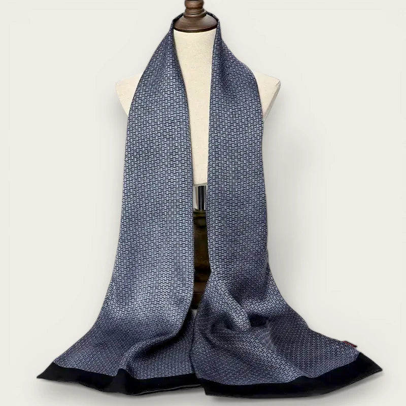 Grey mens silk scarf in navy blue with geometric pattern and black trim