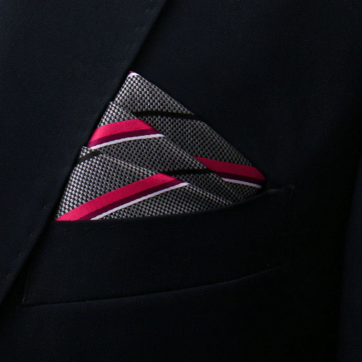 Sleek grey pocket square with bold magenta white diagonal stripes