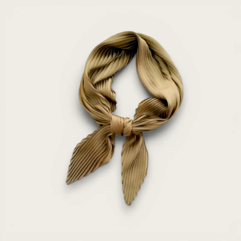 Beige pleated silk hair wrap scarf tied in knot with tapered ends