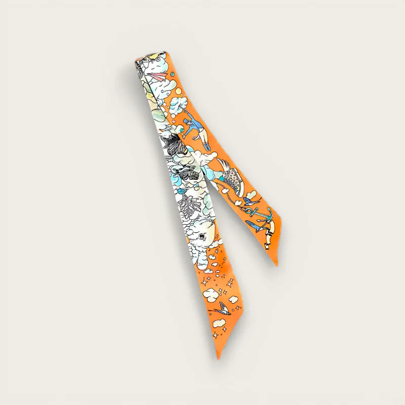 Orange Handle Scarf with whimsical white, blue, black, yellow cartoons