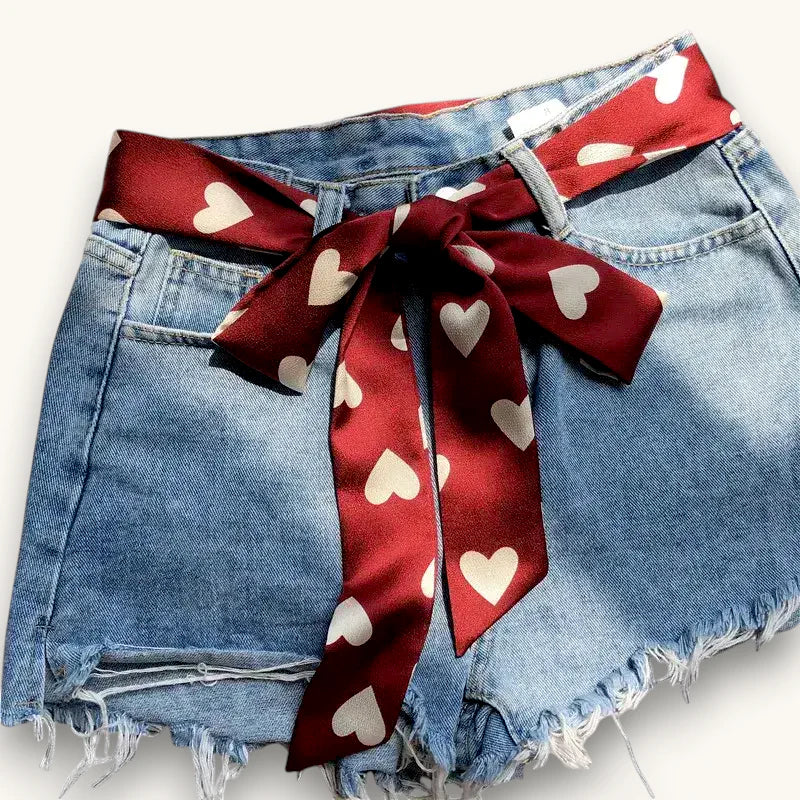 Heart Scarf Belt: red satin ribbon bow with white hearts on denim shorts waist