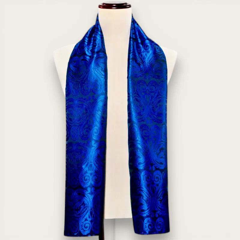 Italian silk scarf for men in rich royal blue satin with swirling paisley pattern on mannequin