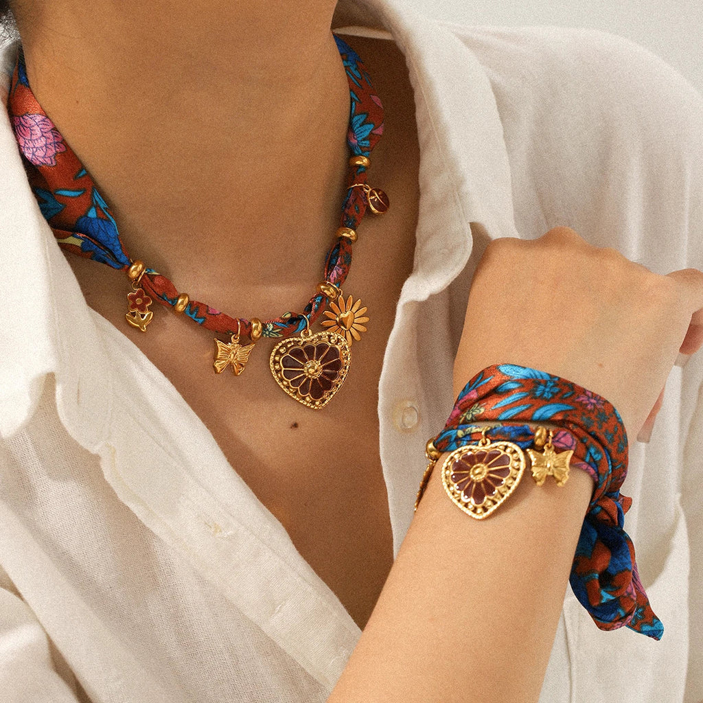 Vibrant patterned silk Jewelry Scarf Necklace with gold heart floral charms