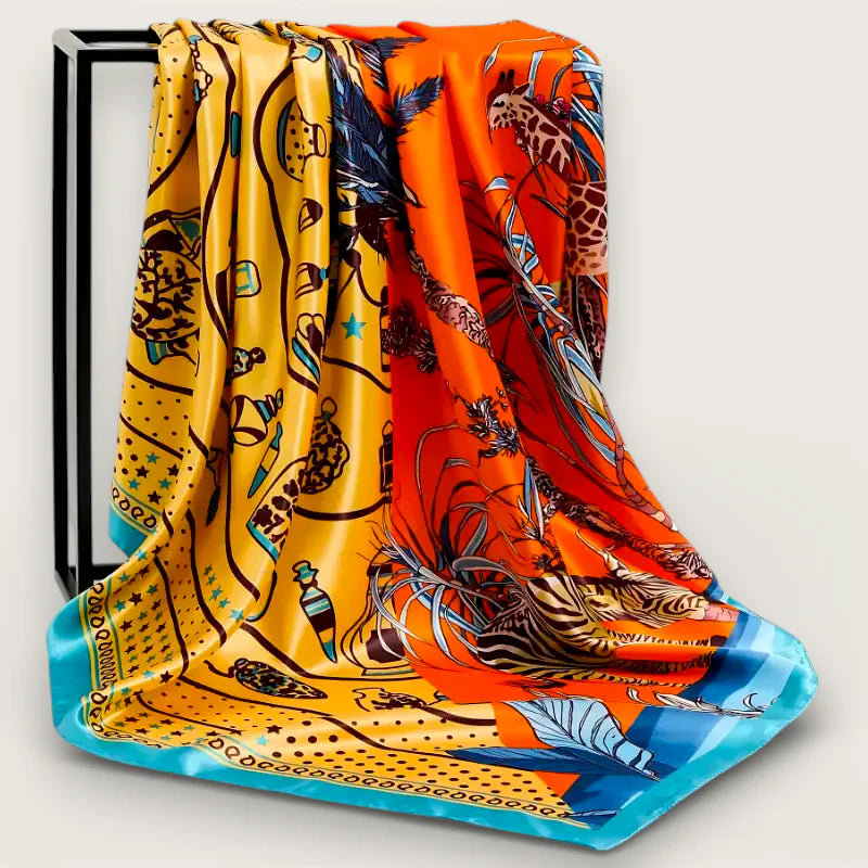 Large animal print scarf in vibrant orange yellow silk with giraffes feathers turquoise accents