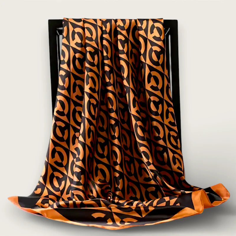 Large brown scarf with luxurious orange black silk geometric pattern