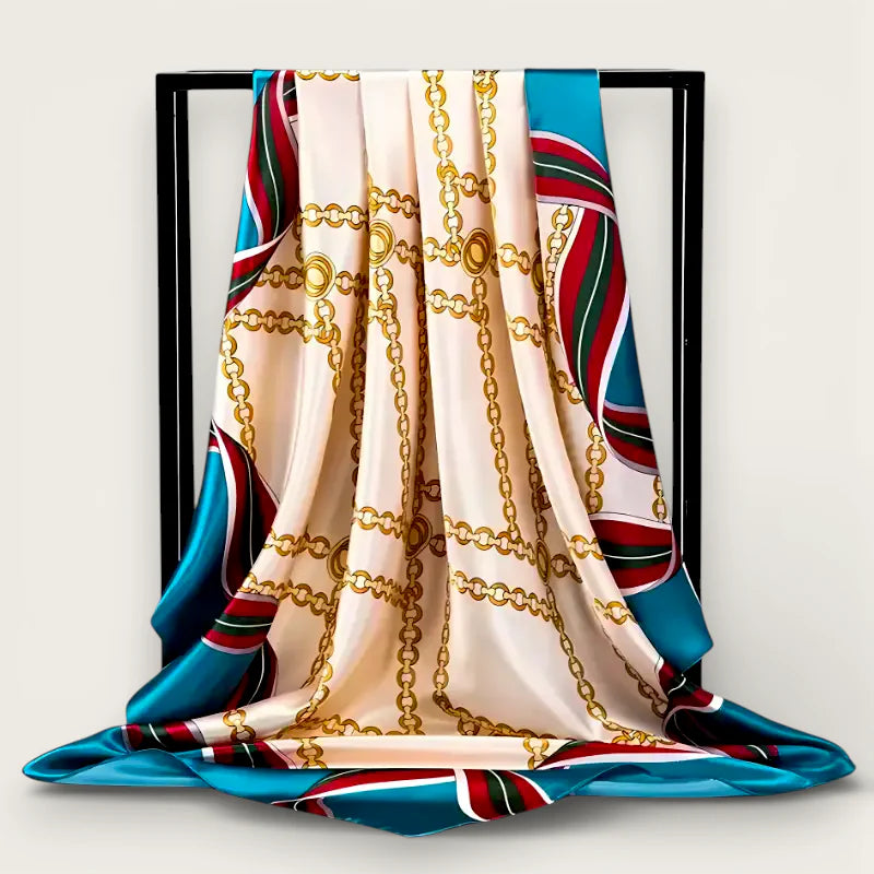 Large square scarf in cream silk with gold chains and teal red green stripes