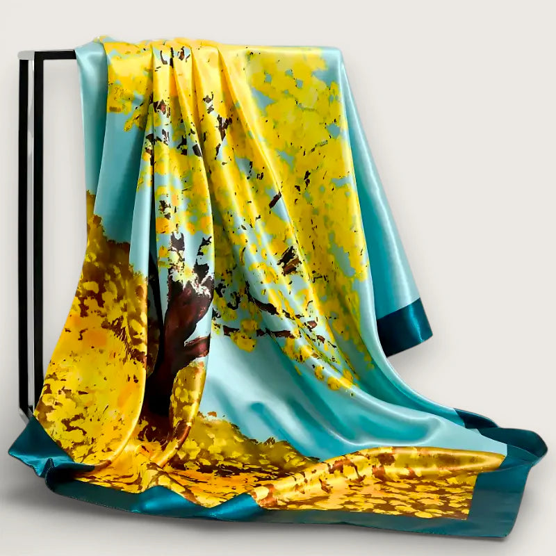 Large yellow and blue silk scarf with vibrant tree and golden leaves design