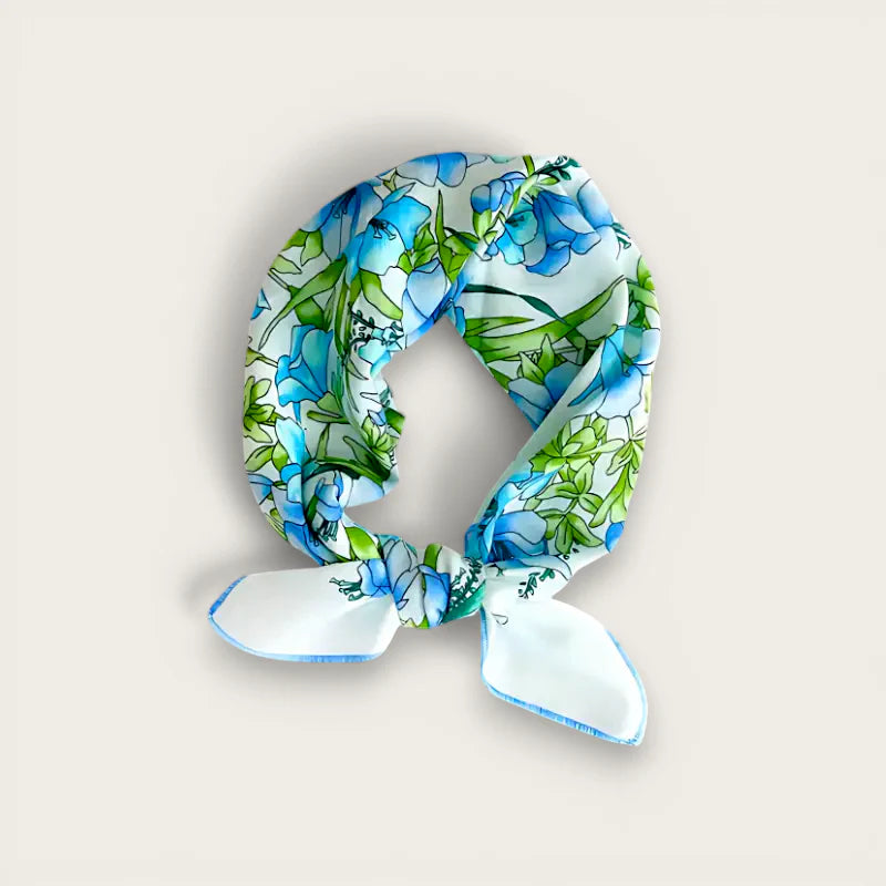 Light blue cotton scarf with delicate blue green floral silk pattern and neat knot