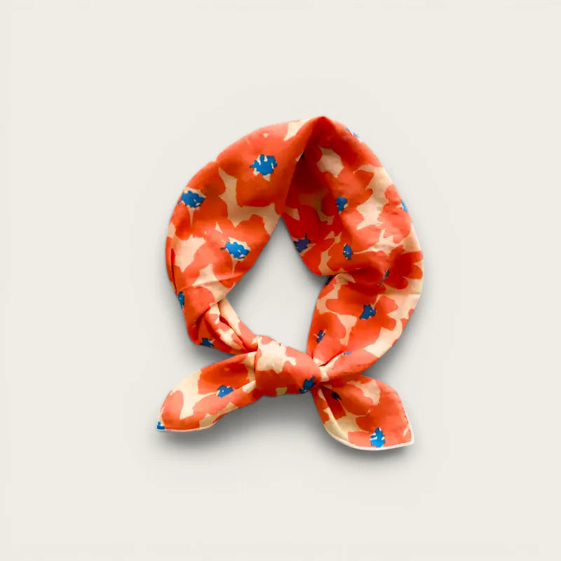 Vibrant orange and cream floral silk scarf in neat knot, Light Cotton Scarf