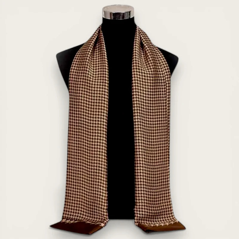 Luxury Mens Silk Scarf in brown cream houndstooth with satin finish on black mannequin