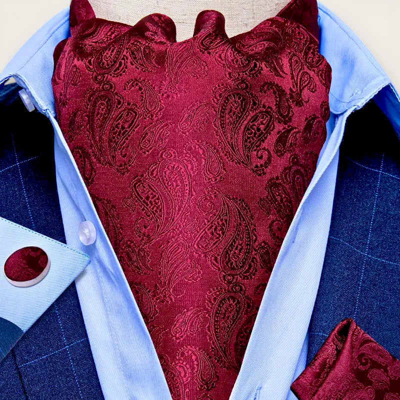 Mens Ascot: burgundy silk cravat with dark paisley on blue shirt