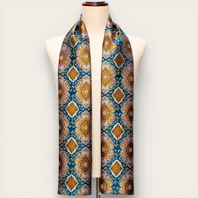 Teal silk mens scarf with gold cream geometric patterns on mannequin