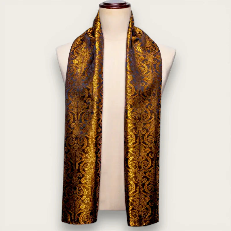 Mens gold silk scarf in luxurious damask pattern draped on mannequin