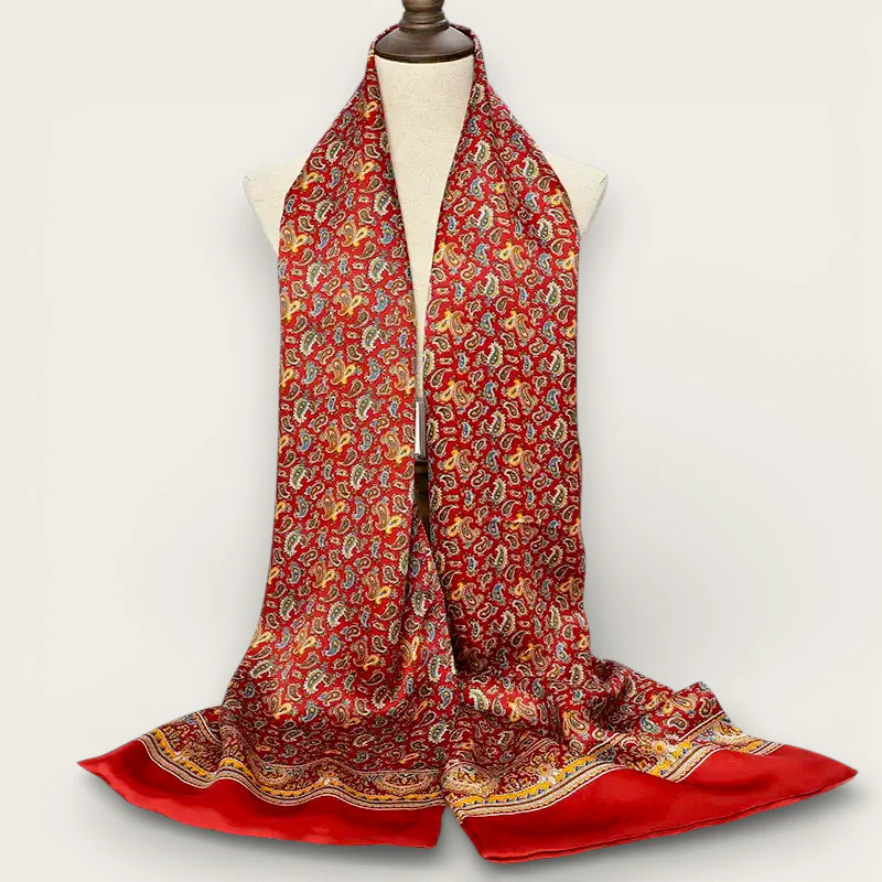 Mens red long silk scarf with vibrant paisley pattern and satin border