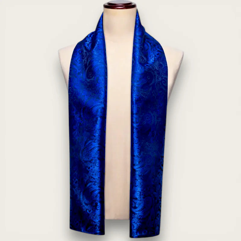 Mens royal blue silk scarf with intricate paisley pattern on mannequin
