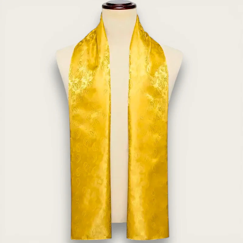Mens yellow silk scarf with golden-yellow paisley pattern on mannequin