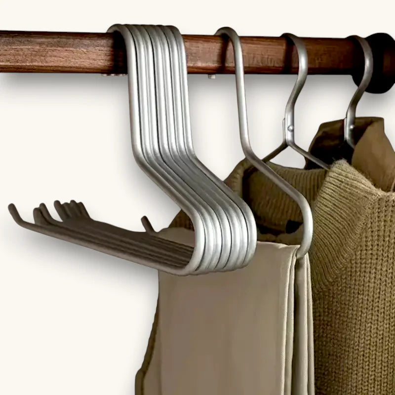 Silver metal scarf hanger with curved design and pants rack