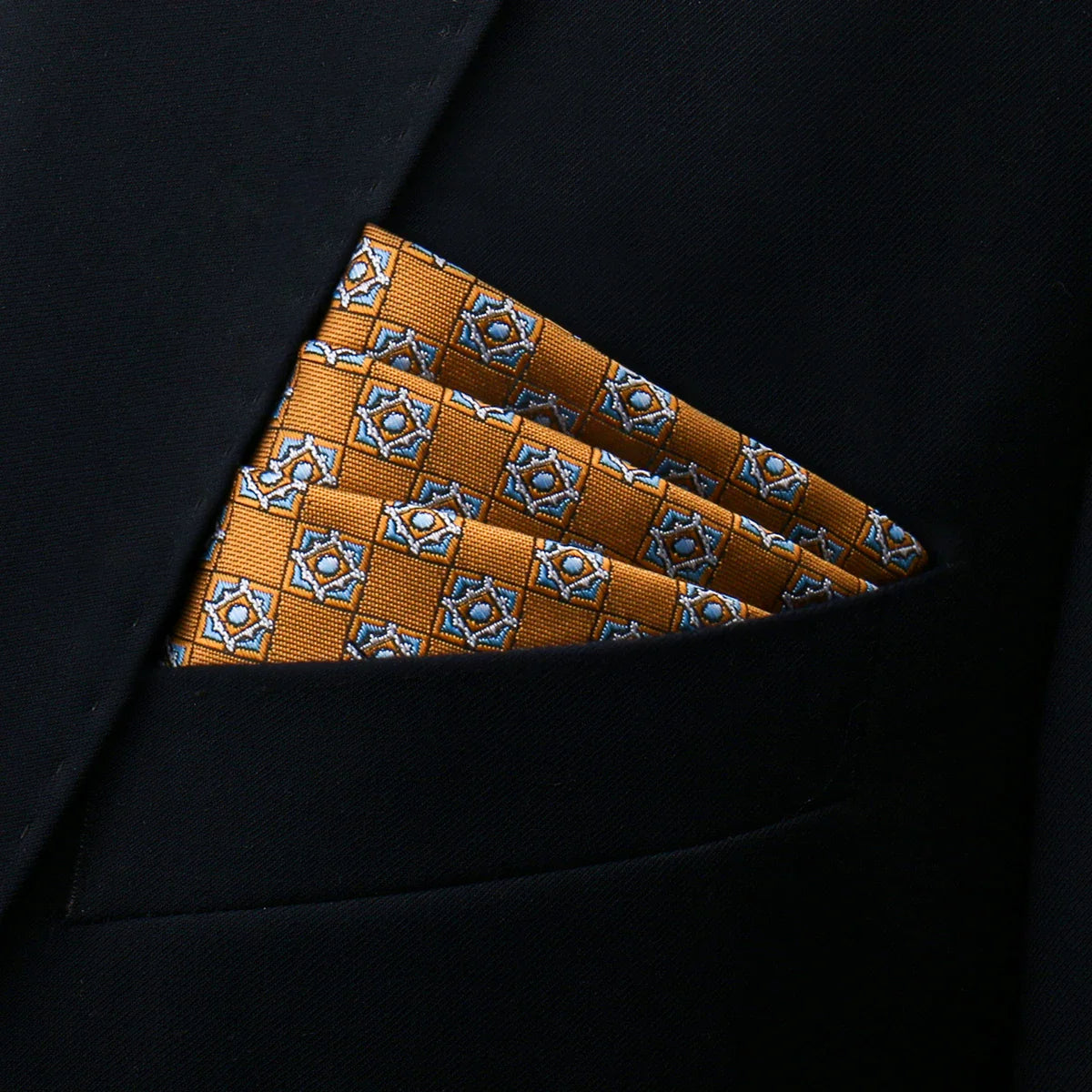 Mustard pocket square in black suit breast pocket