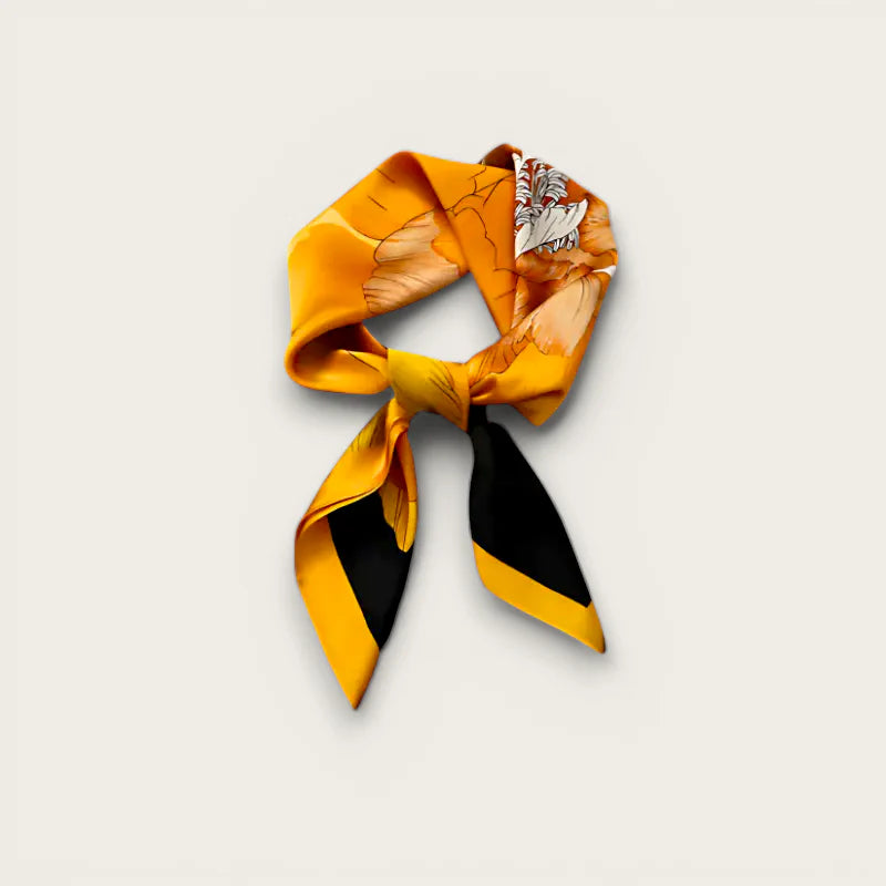 Vibrant orange silk mustard yellow scarf with black white botanical print knot