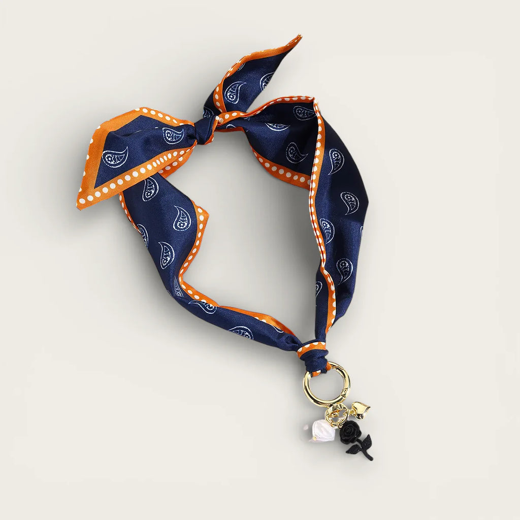 Navy blue and orange paisley silk scarf necklace with gold ring knot
