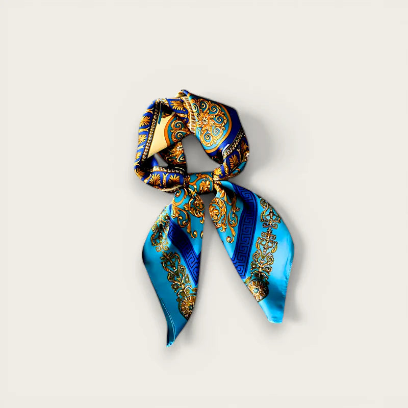 Navy Blue Silk Scarf with vibrant blue silk, gold and navy patterns in knot