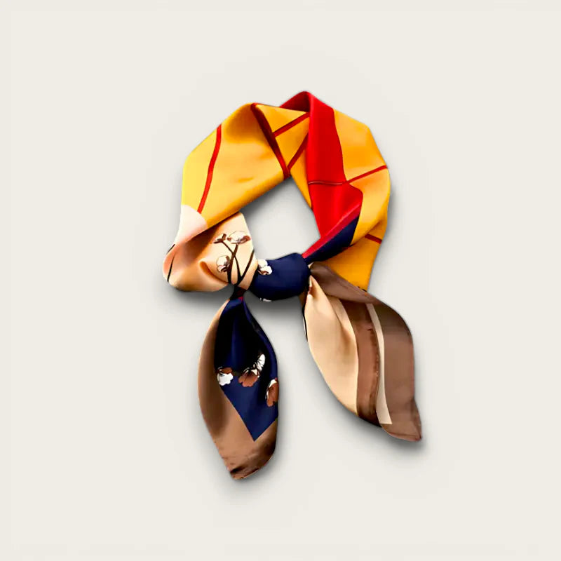 Vibrant orange and brown geometrically patterned silk scarf