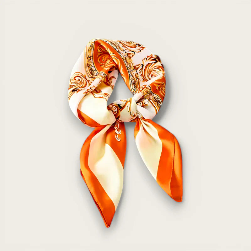 Vibrant orange and cream silk scarf with gold baroque pattern, knotted