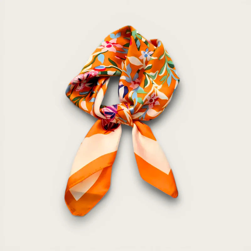 Vibrant orange flower scarf with silk floral pattern and striped ends