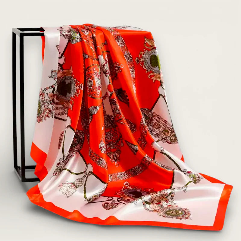 Vibrant orange white silk scarf with ornate metallic pattern