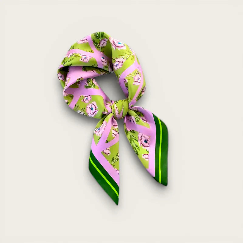 Pink and green silk scarf with vibrant floral print and striped border knot