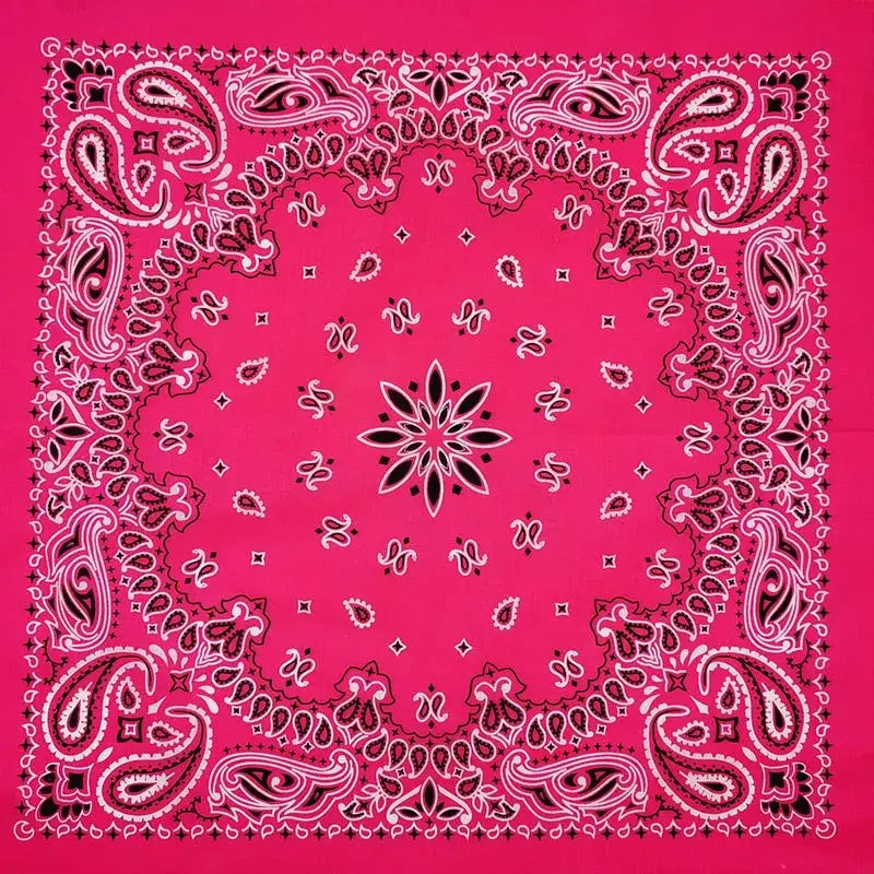 Vibrant pink bandana head scarf with intricate black and white paisley patterns